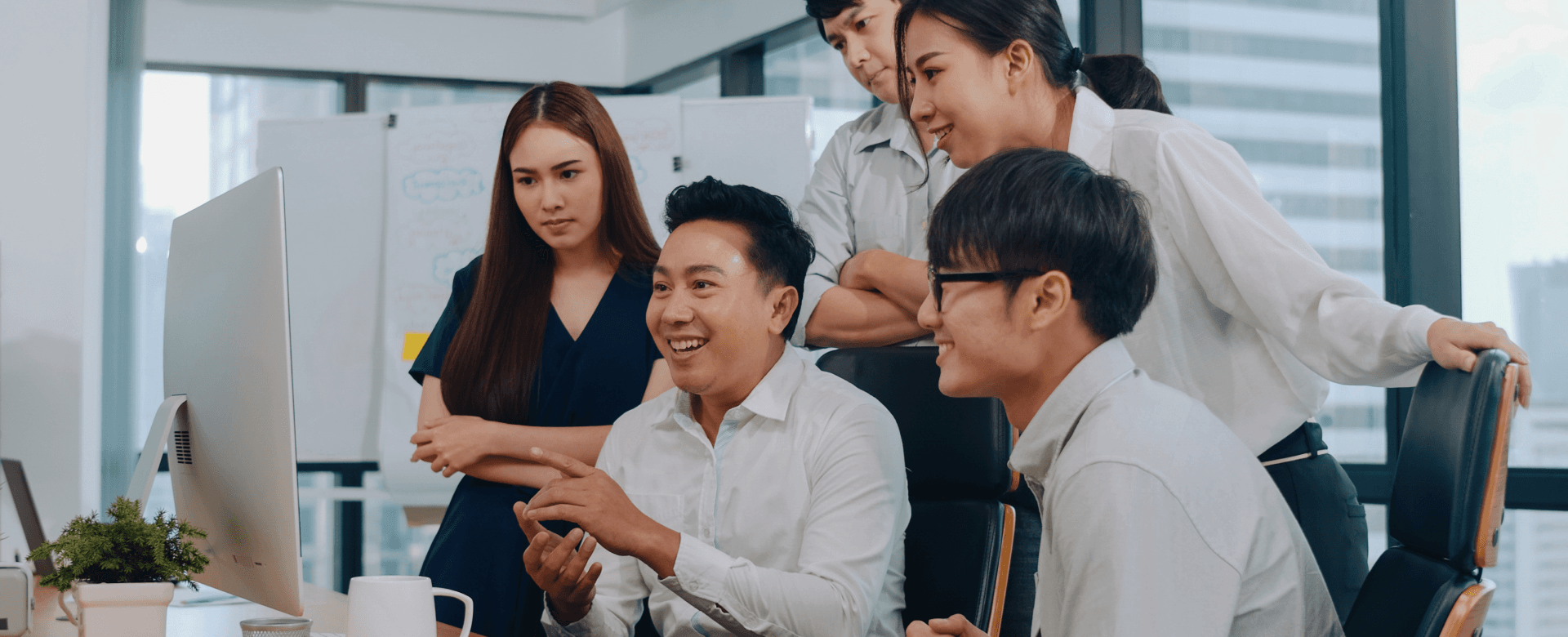 Advo Indonesia team collaborating in the office